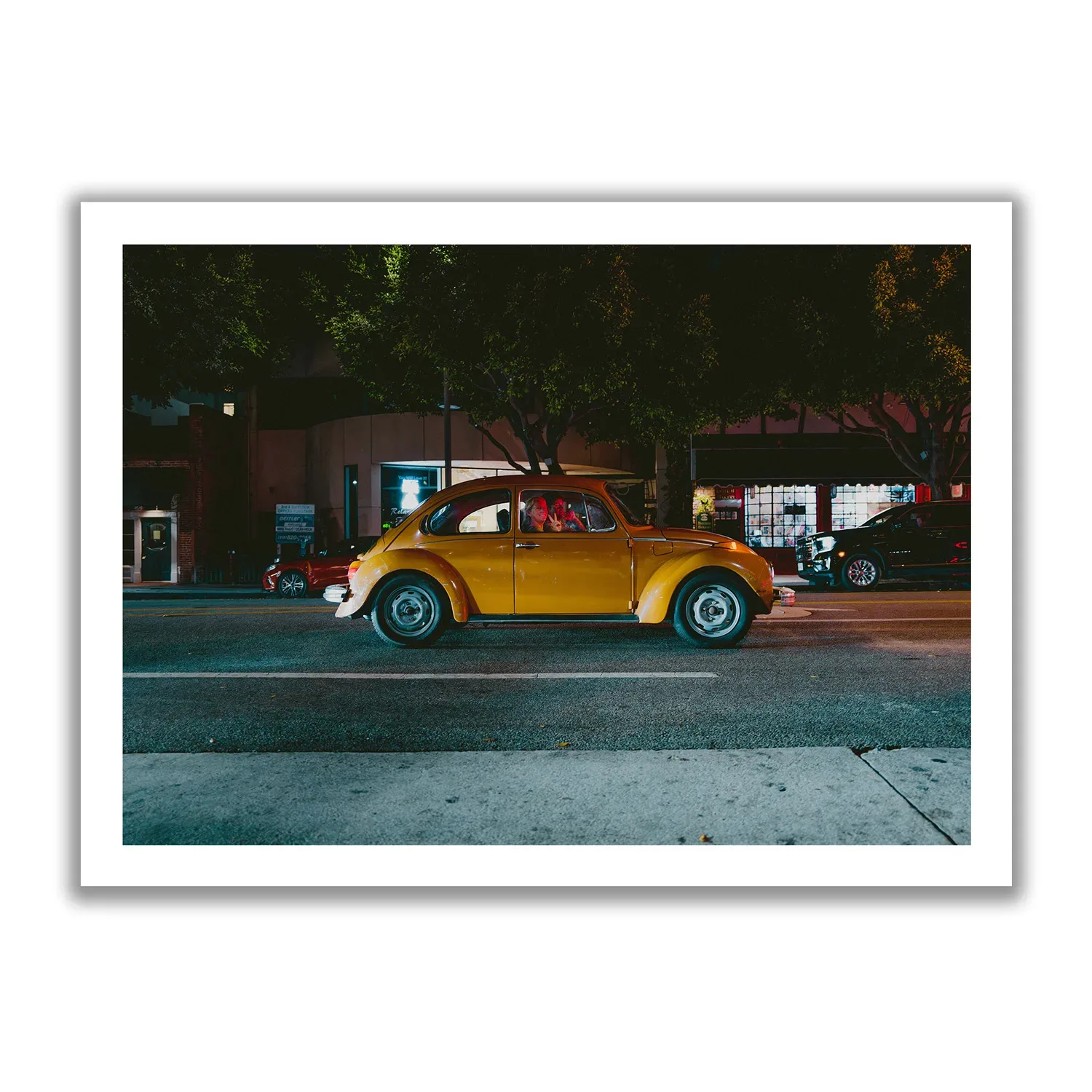 Peace Lady Image of an orange VW Beetle with a woman waving out with the hand gesture "Peace".