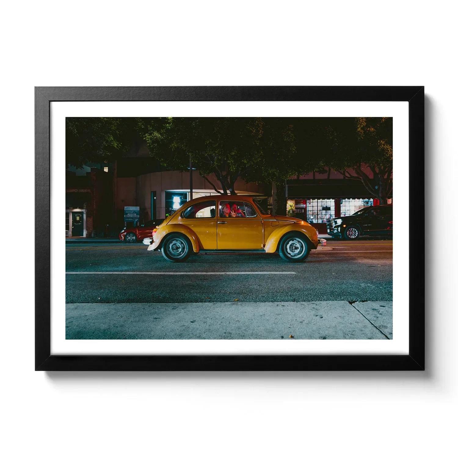 Peace Lady Image of an orange VW Beetle with a woman waving out with the hand gesture "Peace".