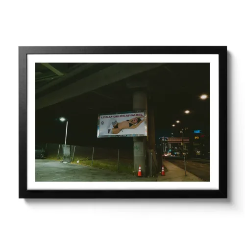 Image taken at night from a billboard showing a revealing lady in her underwear