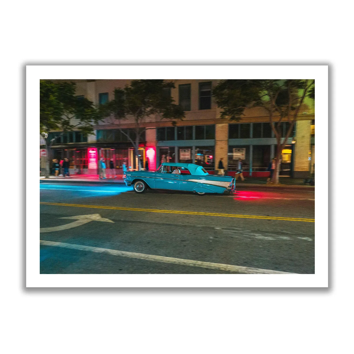 Low Rider Blue low rider driving through the streets of Santa Monica at night.