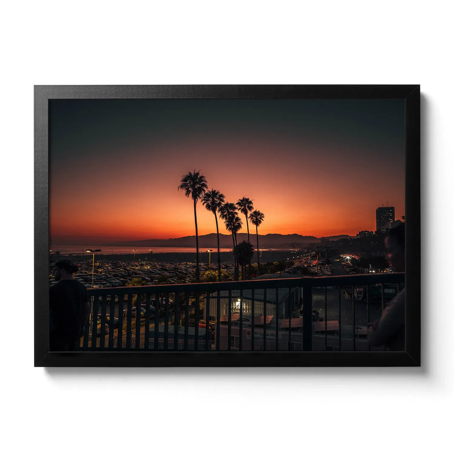 Sunset Pier Yellow-red sunset with palm trees in Santa Monica