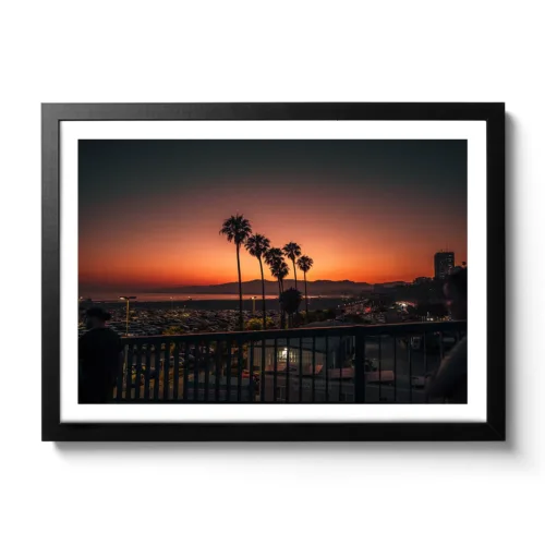 Yellow-red sunset with palm trees in Santa Monica