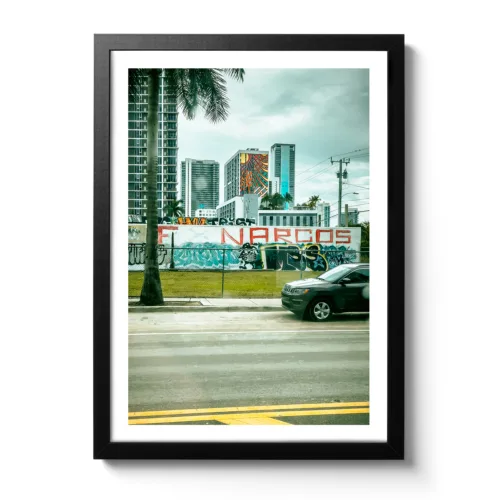Image showing a graffiti Narcos lettering in red on a wall in Miami.