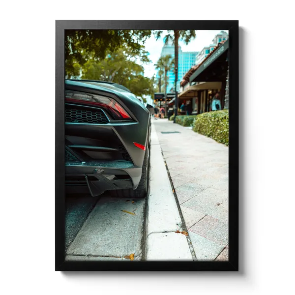 Picture of a black Lamborghini Gallardo parking.