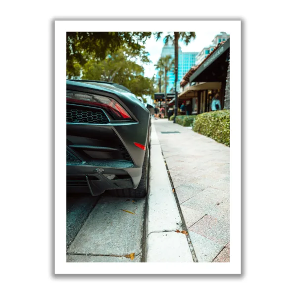 Picture of a black Lamborghini Gallardo parking.